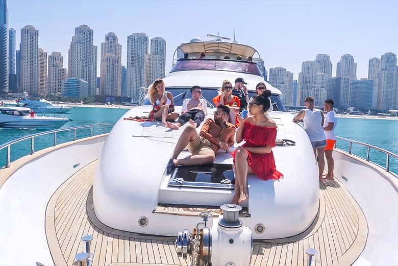 A group of friends on the deck of the yacht