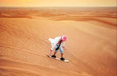 Sandboarding in the Dubai Desert